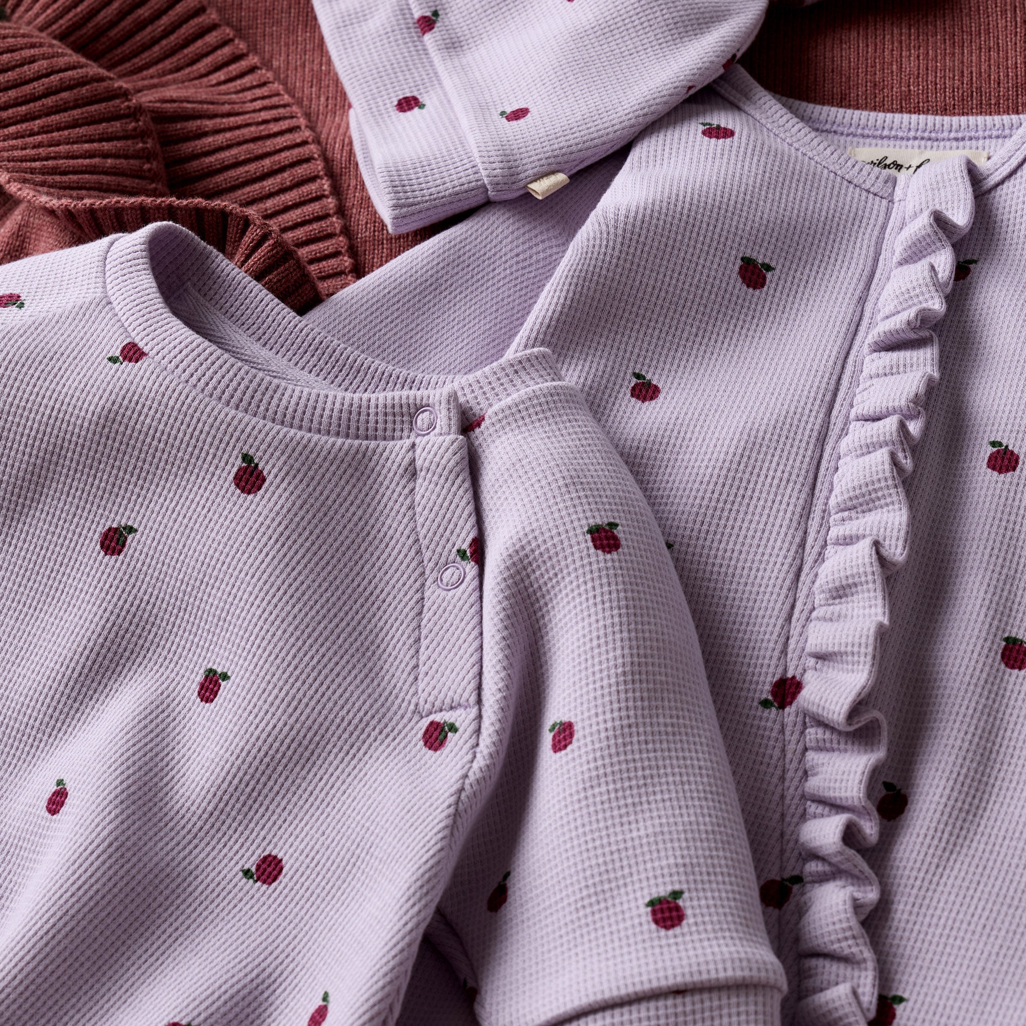 Berry Plums Organic Waffle Ruffle Zipsuit