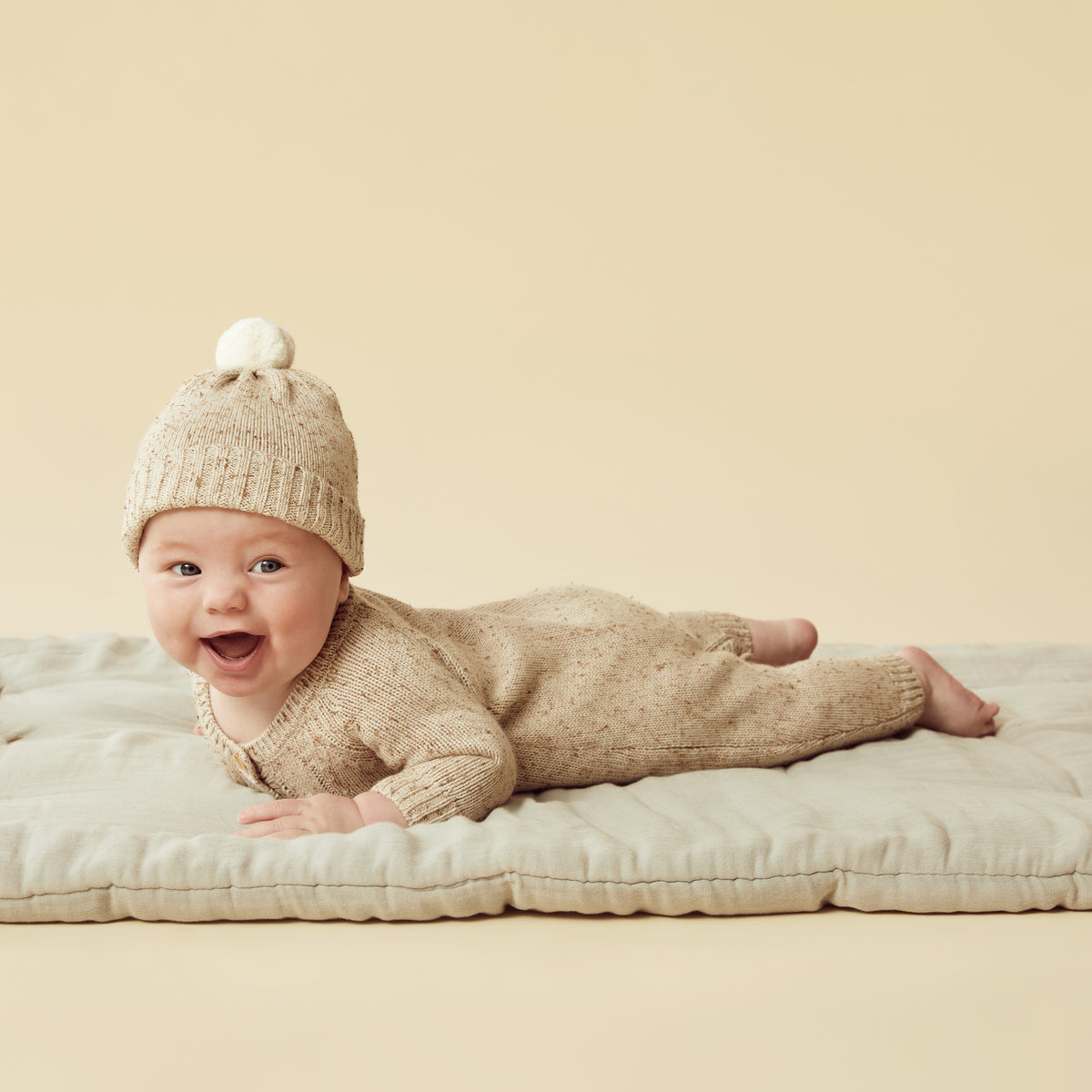 Almond Fleck Knitted Cable Growsuit